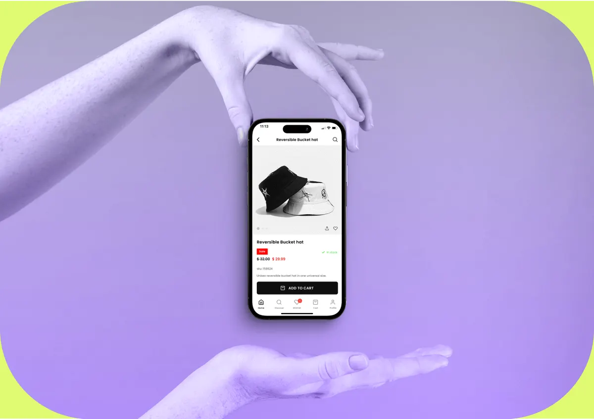 Shopping app displayed on a phone between two hands